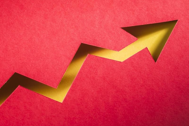 Guldpil som visar upp och nedgång